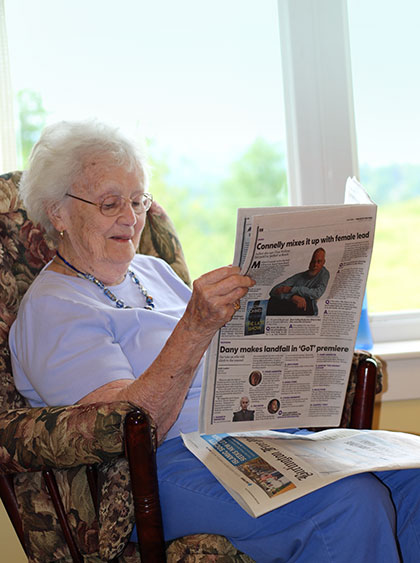 Westview Resident Reading Paper